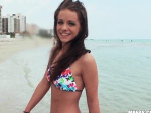 Bikini clad brunette Michelle Bella is fucked in her hotel room