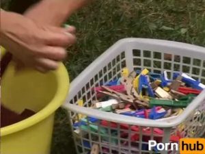 Mature with big tits pleasuring herself in the backyard