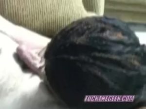 Ebony swinger Honey swallows a stiff white cock
