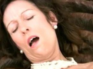 Intense cougar orgasm from dildo
